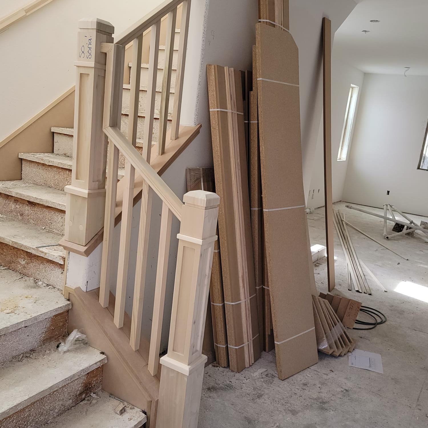 Wrought iron baluster replacement on a curved staircase