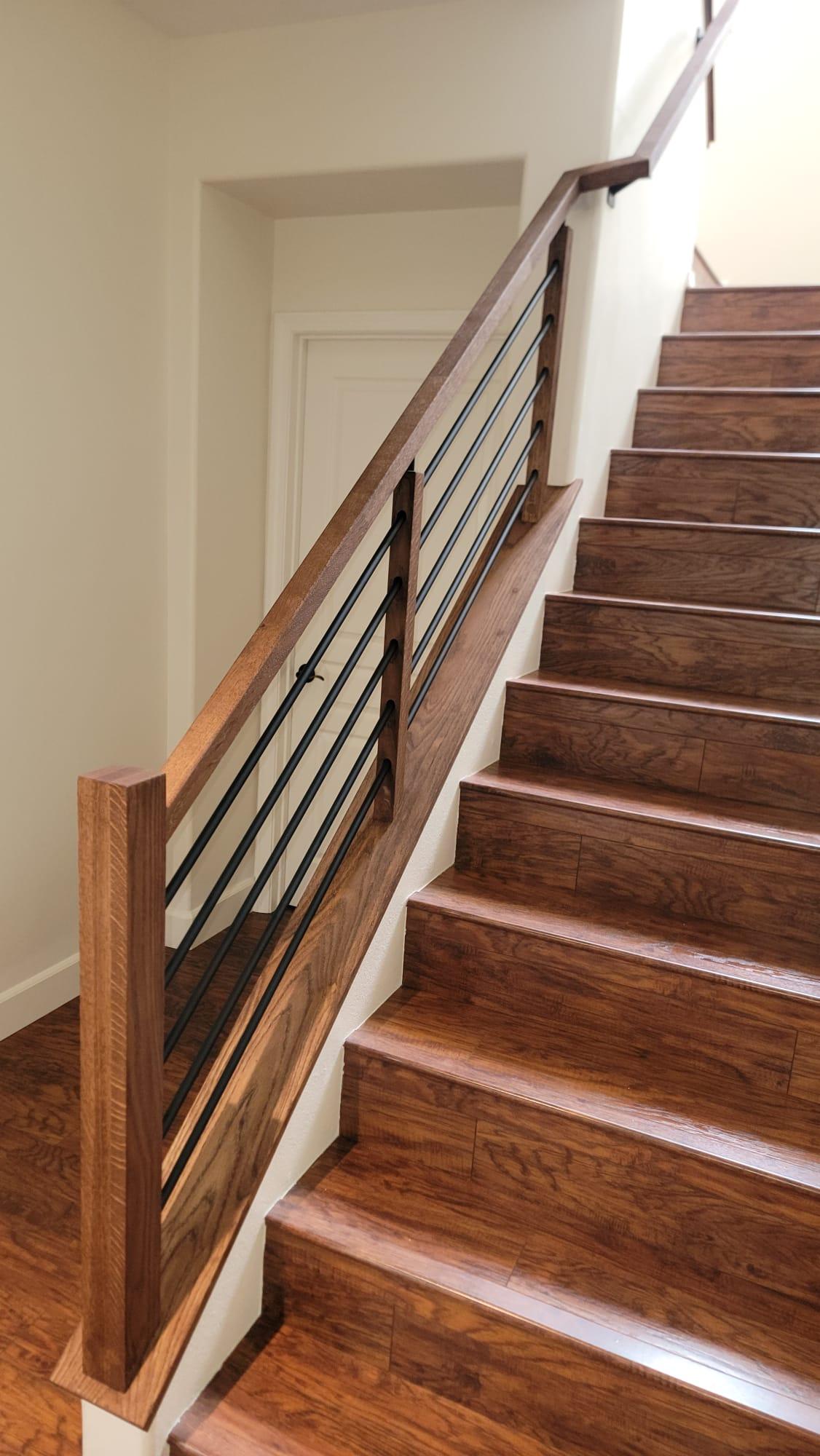 Custom stair build with clean modern railing lines
